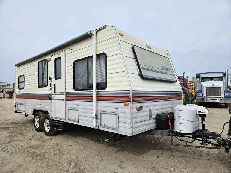 1993 Fleetwood 23C 24’ Travel Trailer, sold March 2025