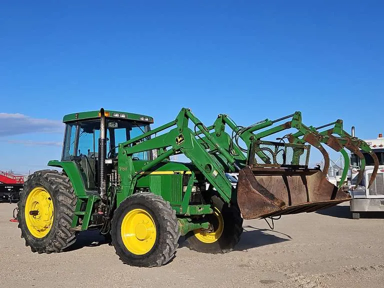 1999 John Deere 7410 120HP MFWD Tractor w/ 740 Loader Attachment, sold March 2025