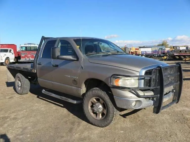 2004 Dodge 2500 4 x 4 Pickup with 8' 6" Steel Flatbed, sold November 2022