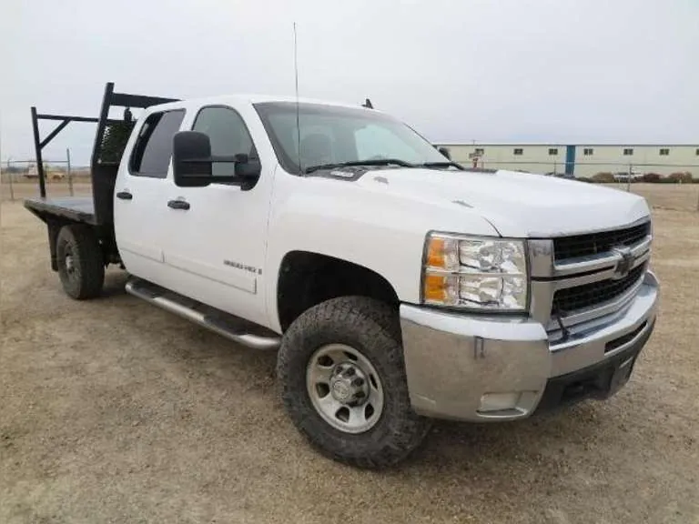 2007 Chevy 3500 HD 4x4 Pickup with 9' Steel Flatbed, sold November 2022