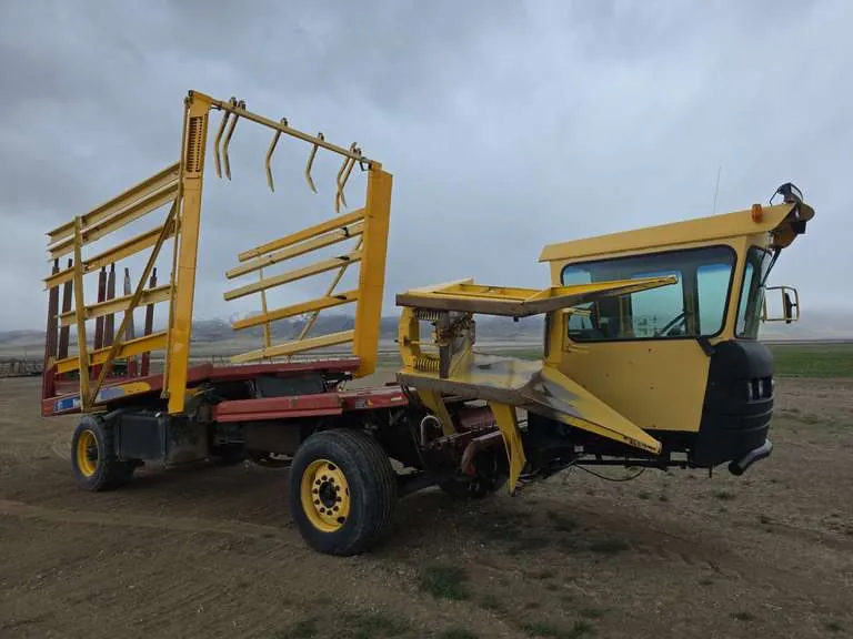 2007 New Holland H9880 Stacker, sold April 2025