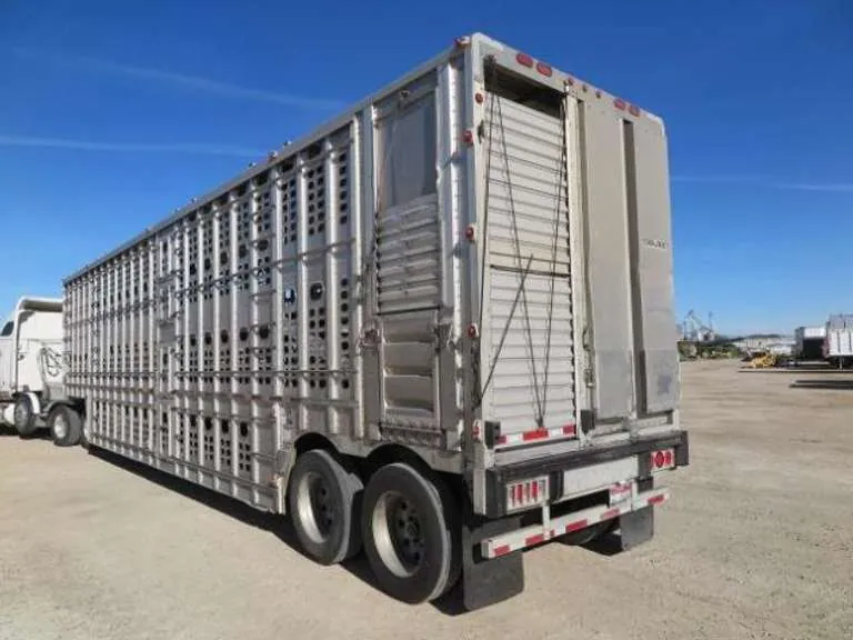 2010 Wilson - 48' Triple Deck Aluminum Livestock Trailer, sold November 2020