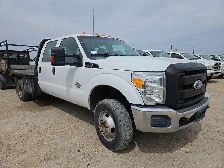 2011 Ford F-350 4x4 Dually Flatbed Pickup, sold June 2025