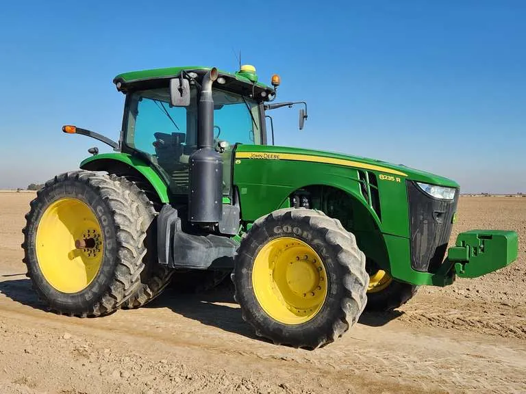 2011 John Deere 8235R 259HP MFWD Tractor, sold February 2024