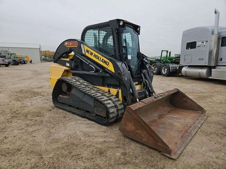2011 New Holland C238 Tracked Skid Steer Loader, sold November 2024
