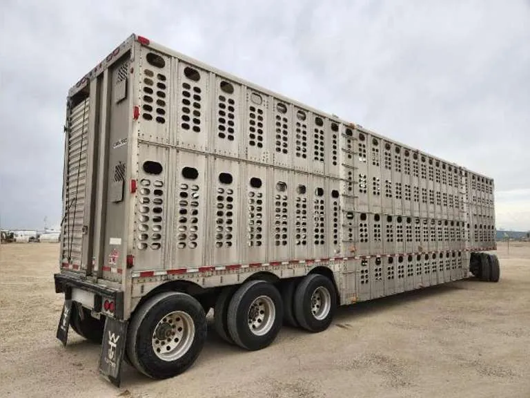 2011 Wilson 53' x 102" Aluminum Livestock Trailer, sold June 2023