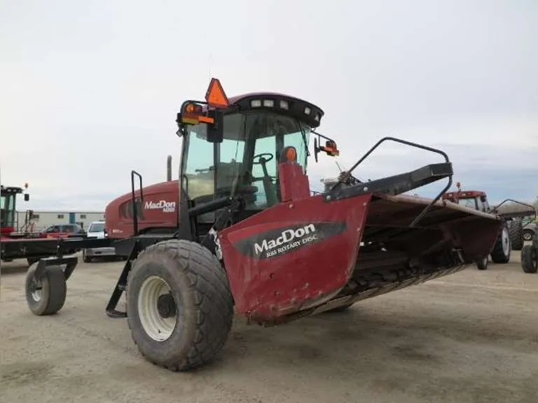 2012 MacDon M205 Self Propelled Windrower with 16' Mac Don R85 Rotary Disk Header, sold March 2022