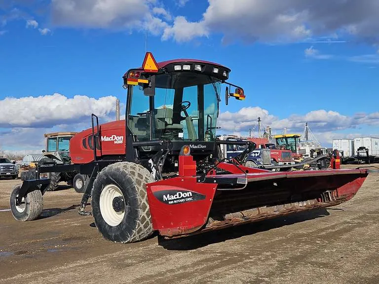 2012 MacDon Mac Don M205 Windrower w/ R85 Rotary Disc Head, sold March 2026