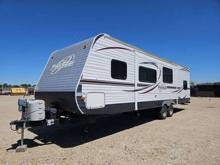 2013 Heartland Pioneer QB30 30’ Travel Trailer, sold June 2024