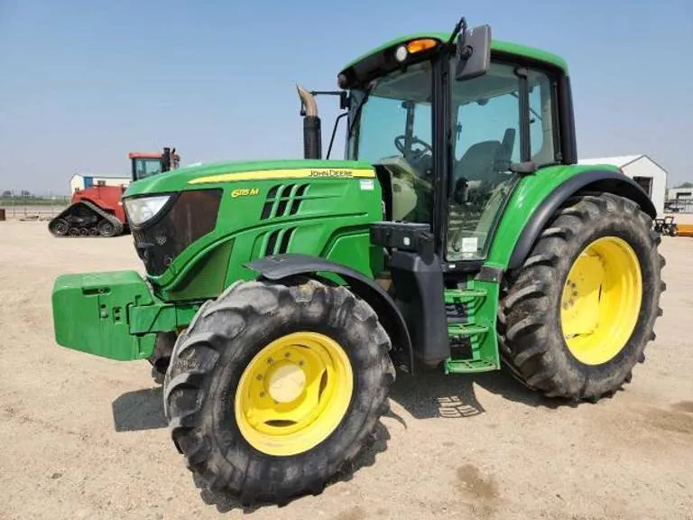 2014 John Deere 6115M 115HP MFWD Tractor, sold June 2023