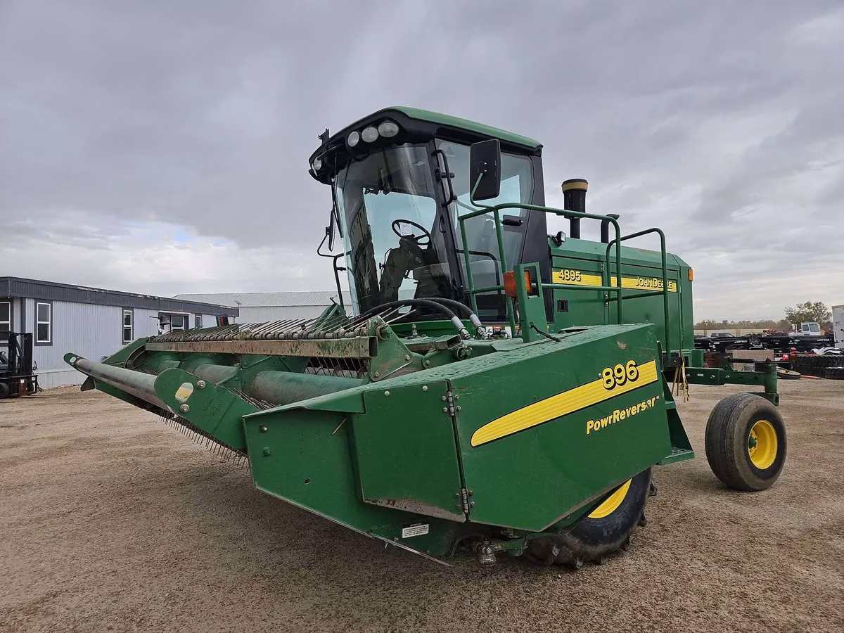 John Deere 4895 windrower with 896 PowReverser header Lot 575 fall open consignment auction