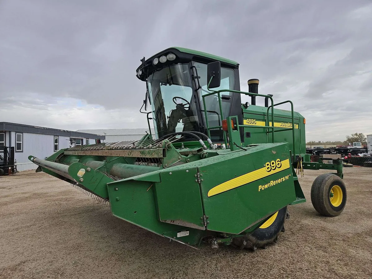 John Deere 4895 windrower with 896 PowReverser header Lot 575 fall open consignment auction