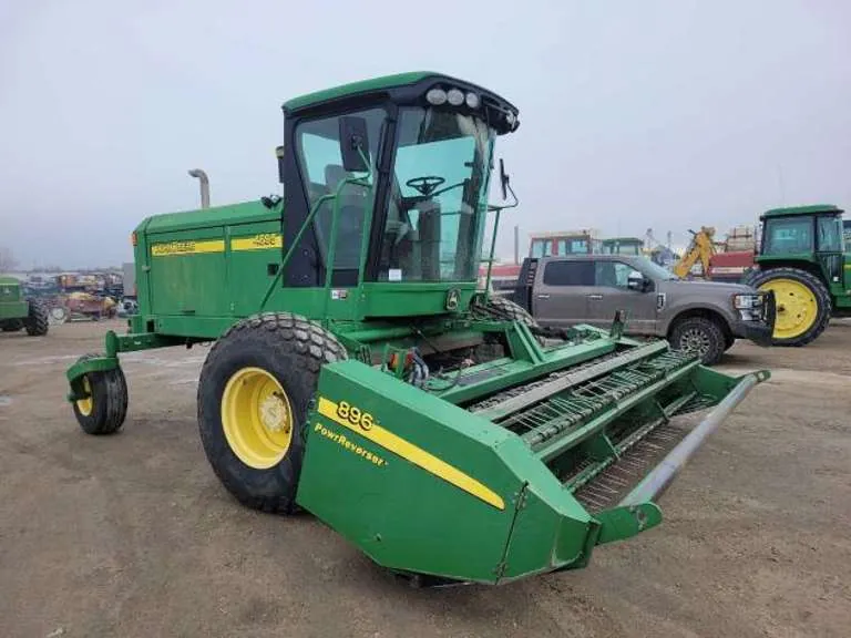 John Deere 4895 Windrower W/JD 896 Header, sold March 2023