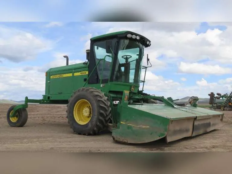 John Deere 4995 Self Propelled Windrower With 995 16' Rotary Header, sold May 2019