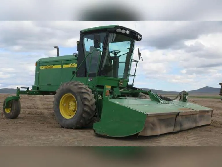 John Deere 4995 Self Propelled Windrower With 995 16' Rotary Header, sold May 2019