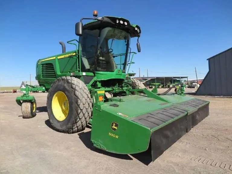 John Deere W235 Self Propelled Windrower, sold February 2023